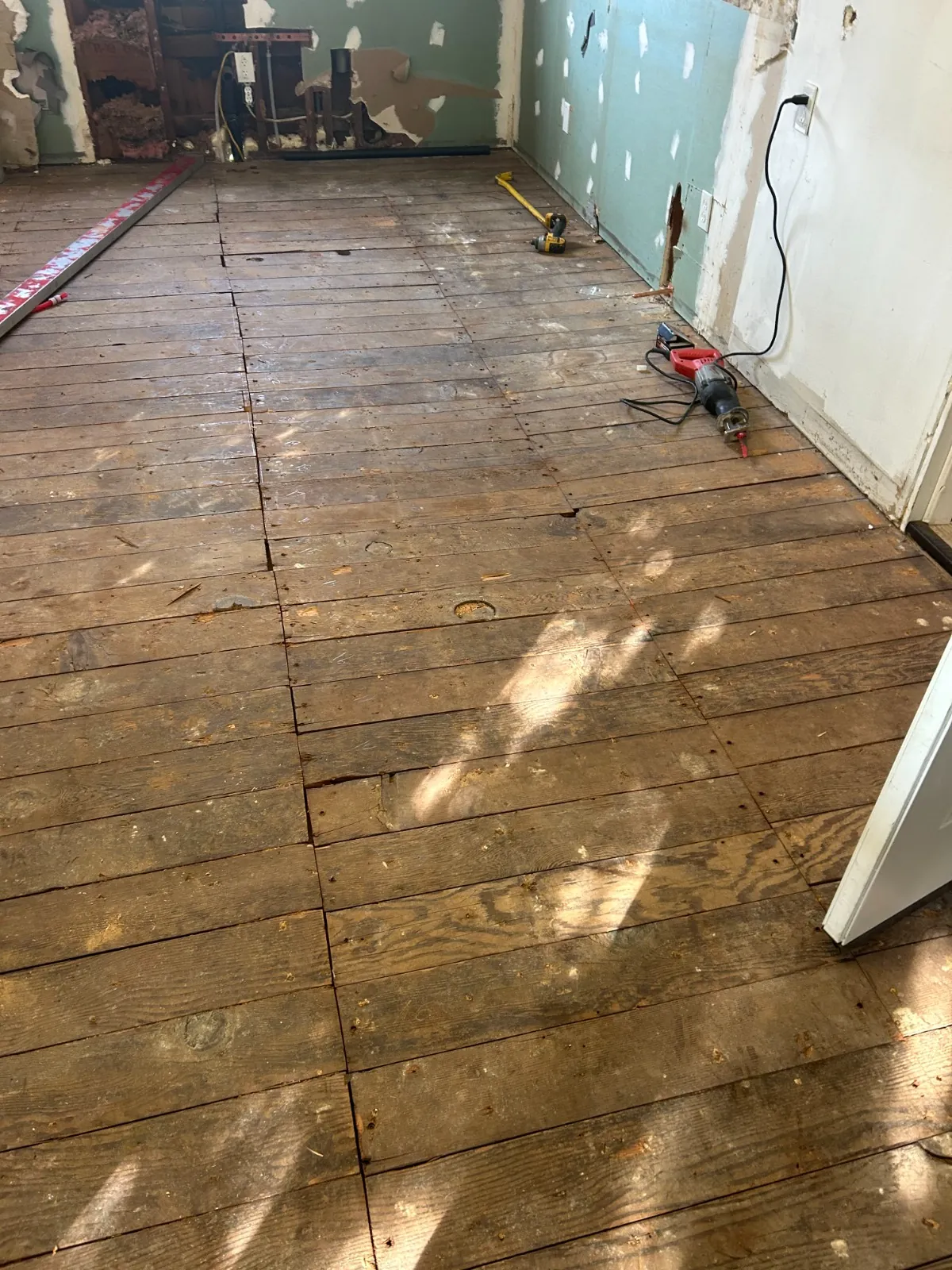 Old plank flooring during removal