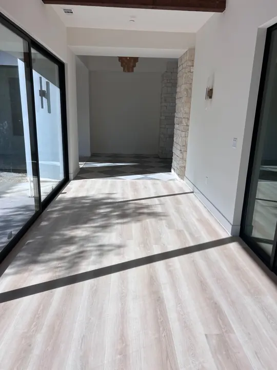 Hallway beside sliding glass doors